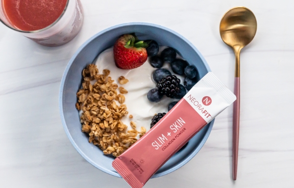 Lifestyle shot of the NeoraFit™️ Slim & Skin being used in a breakfast bowl.
